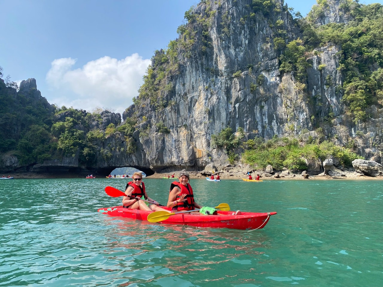 Kayaks near limestone islets in Lan Ha Bay